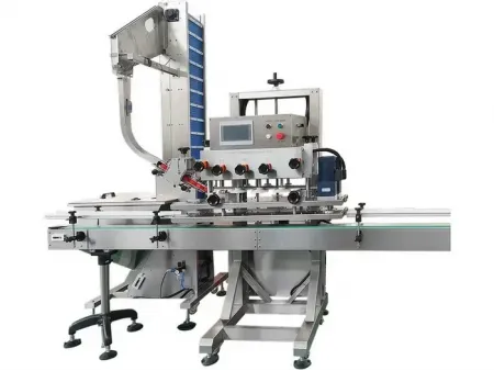 Tappatrice automatica con mandrino